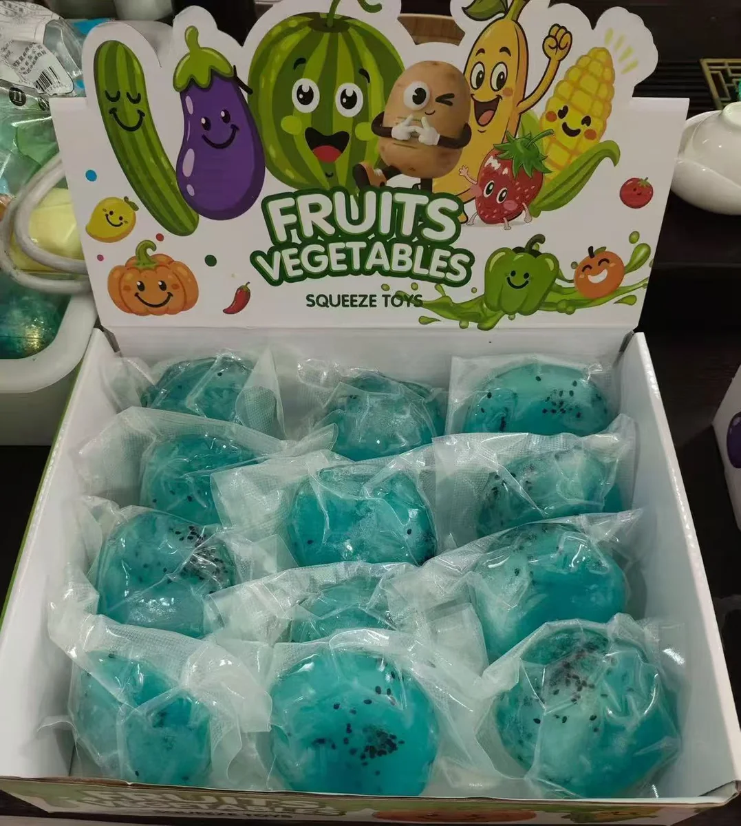 Blue fruit and vegetable squeeze toys